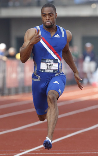 在男子百米决赛中,2007田径世锦赛三金王泰森