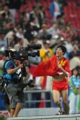 图文：亚运男子110米栏 夺冠后庆祝