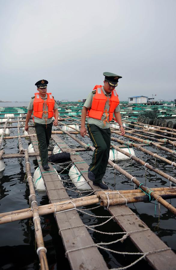 台风“梅花”提速北上袭山东 渔船停港避风