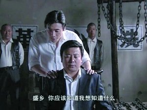 吉思光在谍战剧《潜伏》中饰演保密局档案股股长"盛乡"资料图