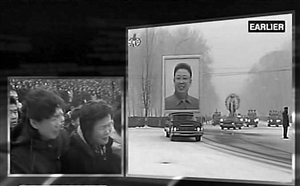 这张12月28日的电视截图显示，朝鲜各界群众在平壤参加朝鲜最高领导人金正日遗体告别仪式 新华社发