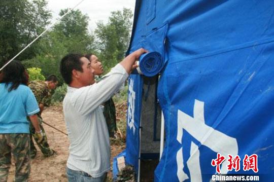 地震致农二师二十二团十余间土坯房坍塌。于飞摄