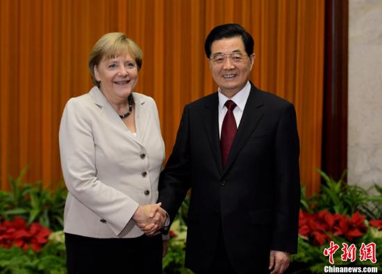 8月30日，中国国家主席胡锦涛在北京人民大会堂会见了德国总理默克尔。中新社发 廖攀 摄