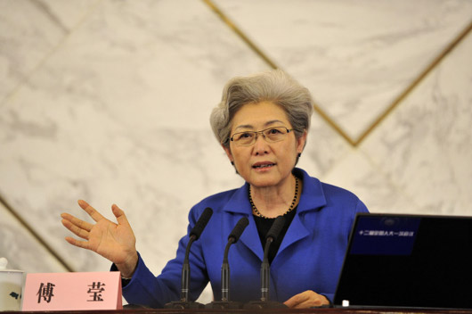 第二位金花,是现任外交部副部长,全国人大史上首位女性发言人傅莹