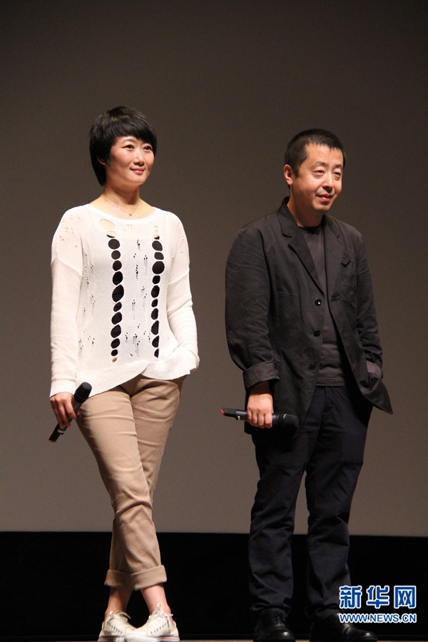 10月8日，中国导演贾樟柯（右）和演员赵涛（左）出席电影《天注定》亚洲地区首映会。