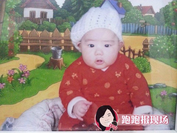 图说：失踪男婴的照片。新民网 记者 胡彦�� 资料图