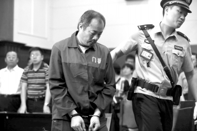 杨学良在门头沟法院受审。京华时报记者欧阳晓菲摄