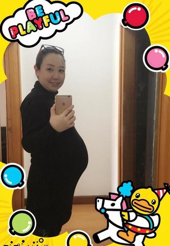 怀孕九个月的肚子图片