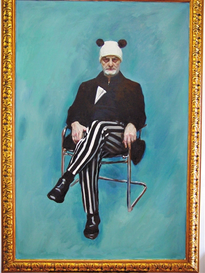 赵半狄创作的乌里·希克肖像，希克头戴一顶熊猫帽子