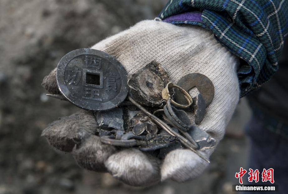 张献忠江口沉银遗址文物亮相堪称世界级考古发现